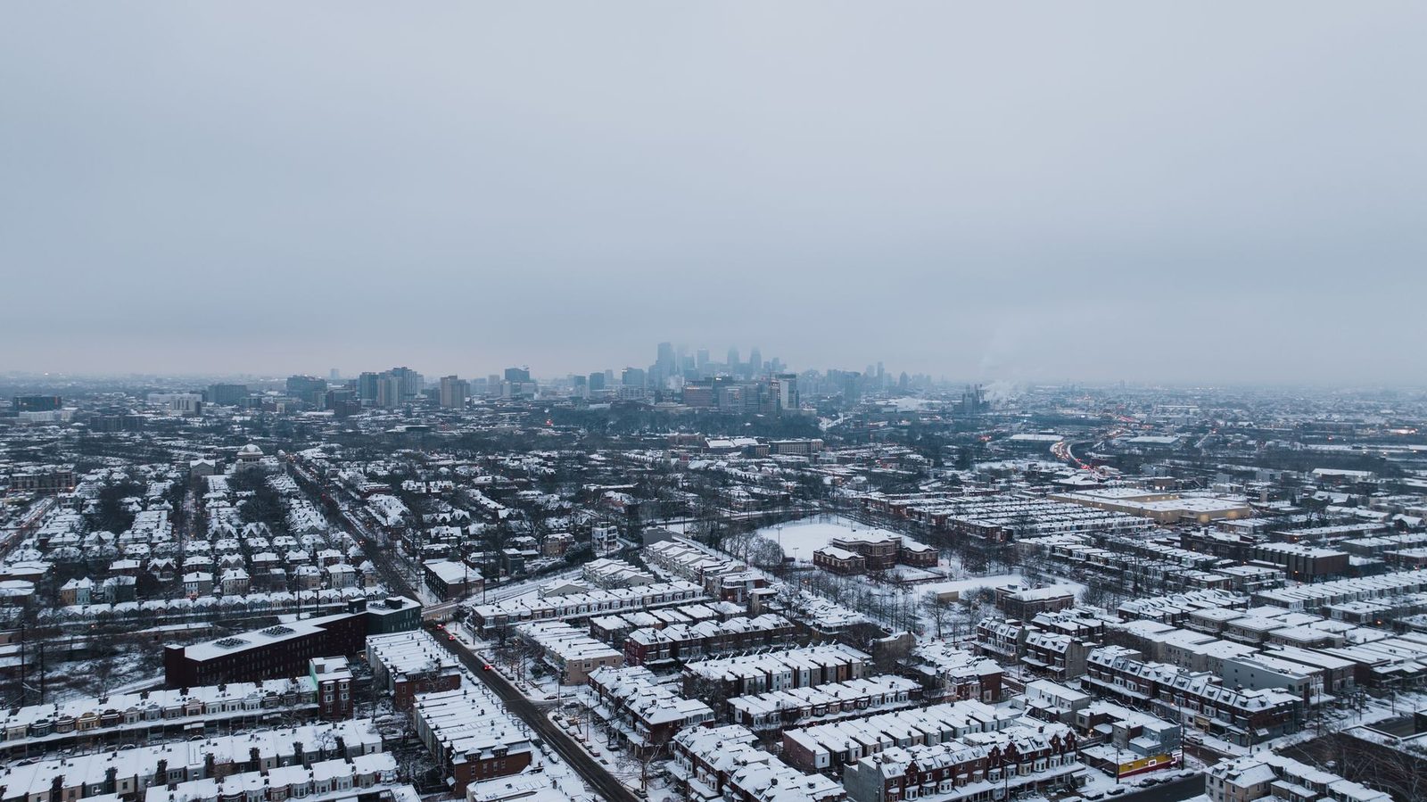 Snow over south Philadelphia with the Center City skyline in the distance